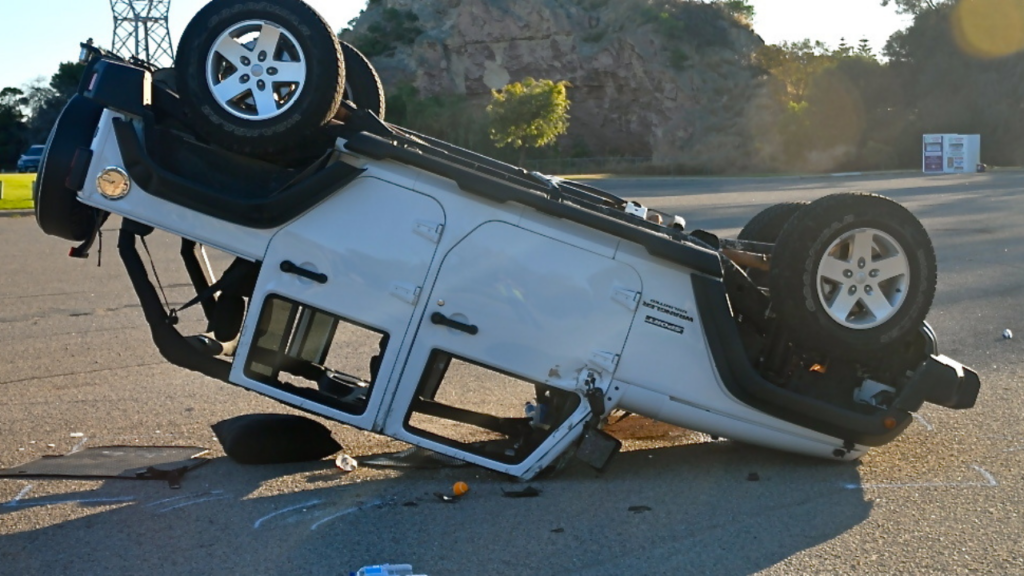 A rollover accident occurs when a vehicle tips over onto its side or roof. 