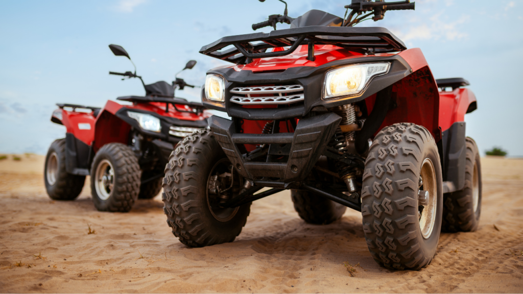 ATVs are motorized vehicles designed for off-road use with low-pressure tires, handlebars for steering, and a seat that is straddled by the operator. While newer models feature four wheels, three-wheeled ATVs, which were discontinued in 1987 due to safety concerns, are still in use by many people today.